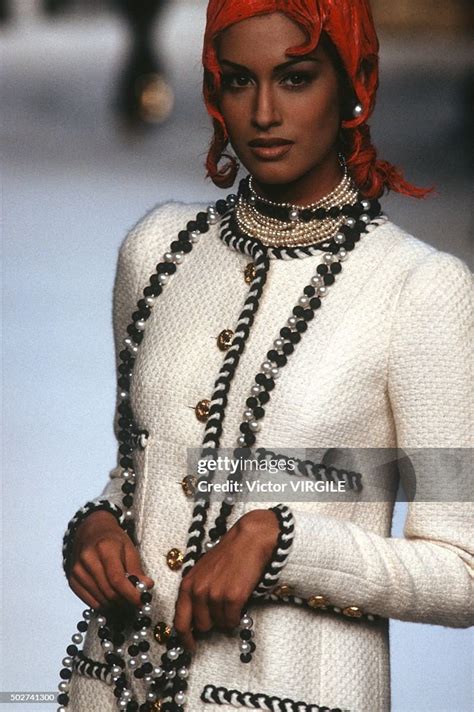 Yasmeen Ghauri walks the runway during the Chanel Haute 